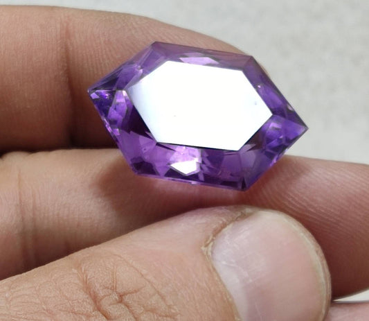 An amazing faceted fancy hexagon cut amethyst gemstone 36 carats