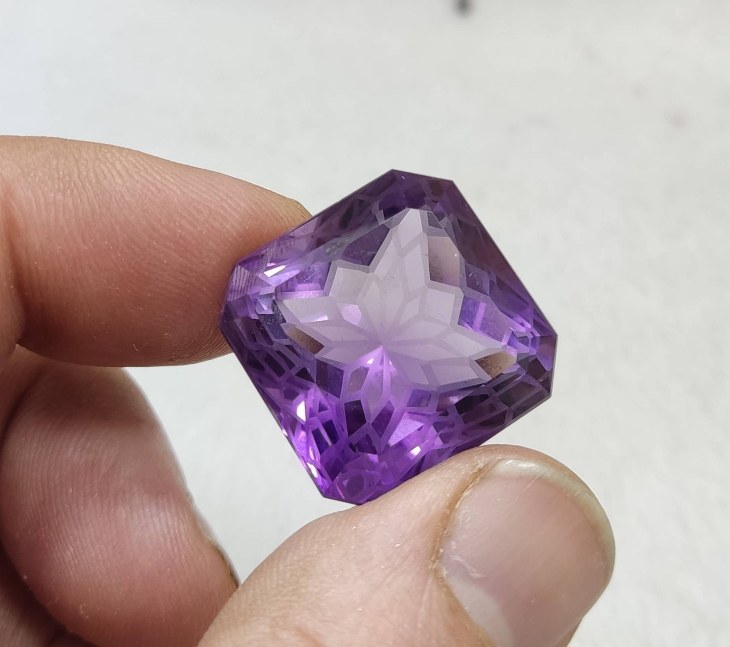 Amethyst faceted octagon cut gemstone 64 carats