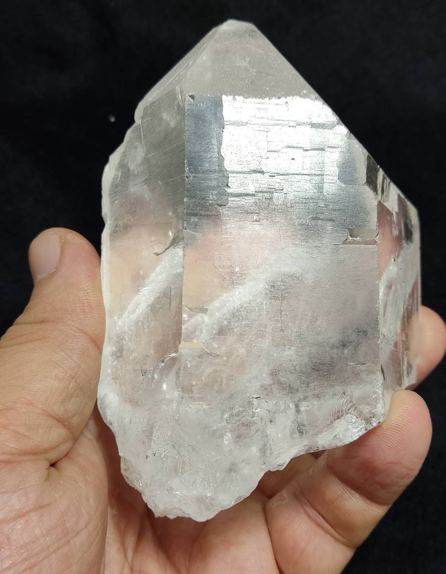 An amazing high grade very clear specimen of terminated Quartz Crystal 620 grams