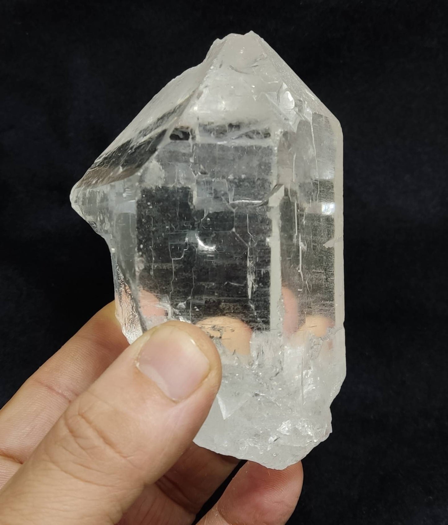 An amazing high grade very clear specimen of terminated Quartz Crystal 620 grams