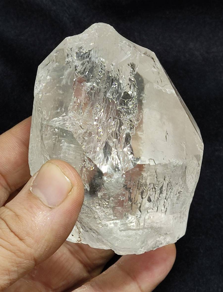 An amazing high grade very clear specimen of terminated Quartz Crystal 460 grams