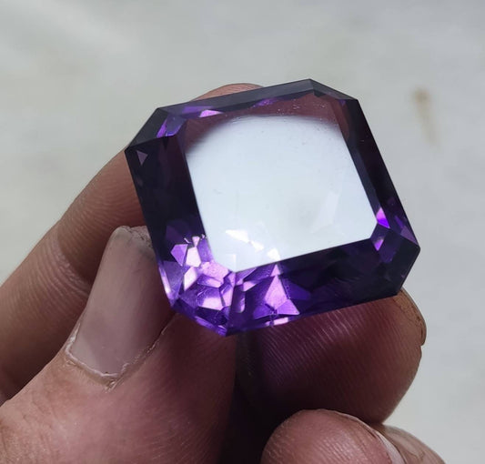 An amazing faceted octagon cut amethyst gemstone 64 carats