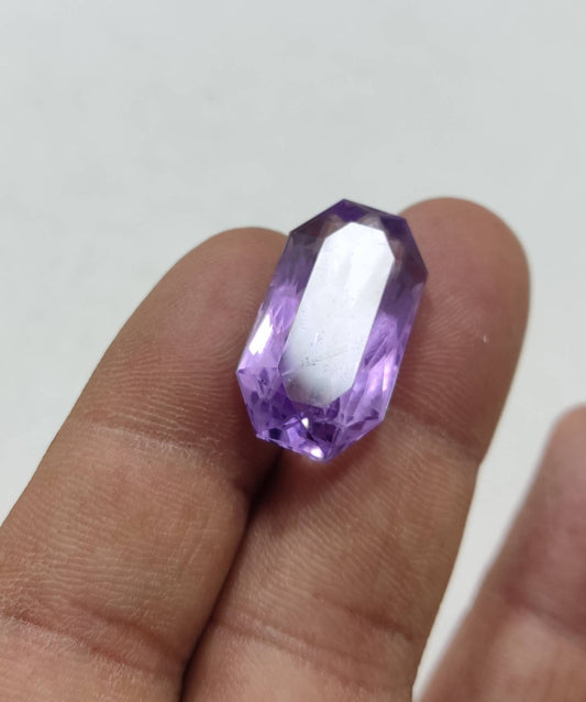 An amazing faceted custom elongated octagon cut amethyst gemstone 23 carats