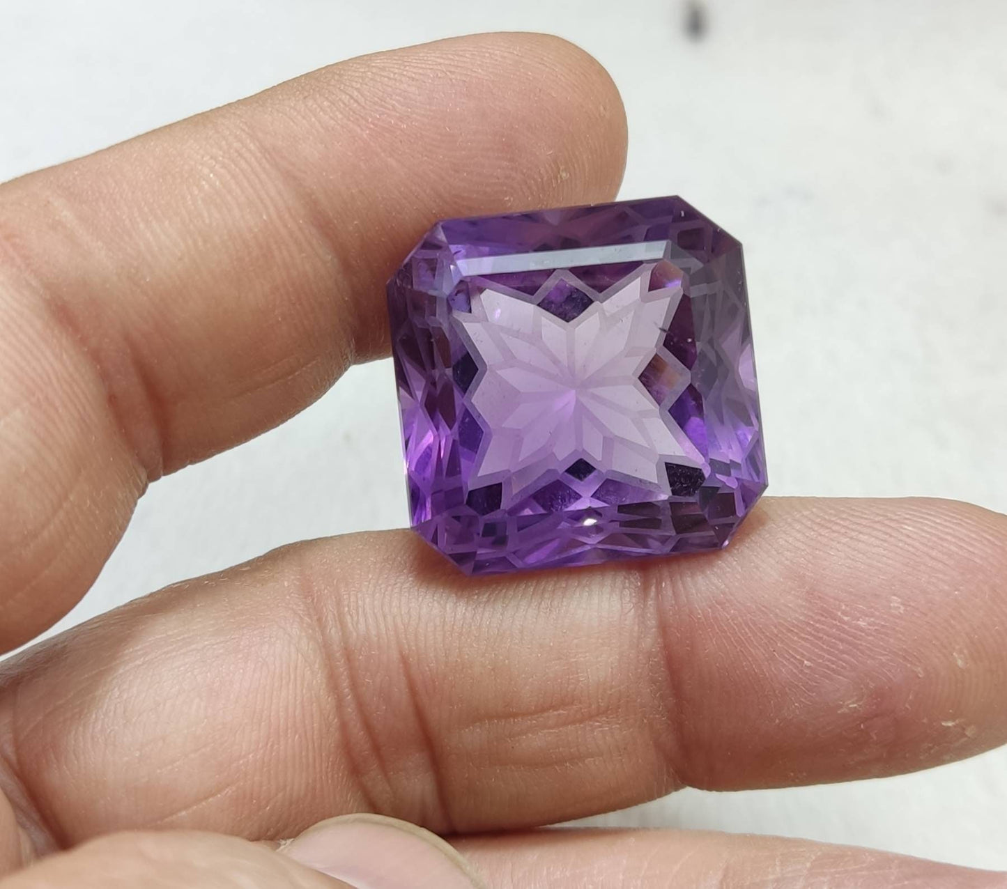 Amethyst faceted octagon cut gemstone 64 carats
