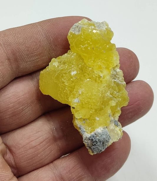 An amazing specimen of Natural Intense yellow color Brucite 34 grams