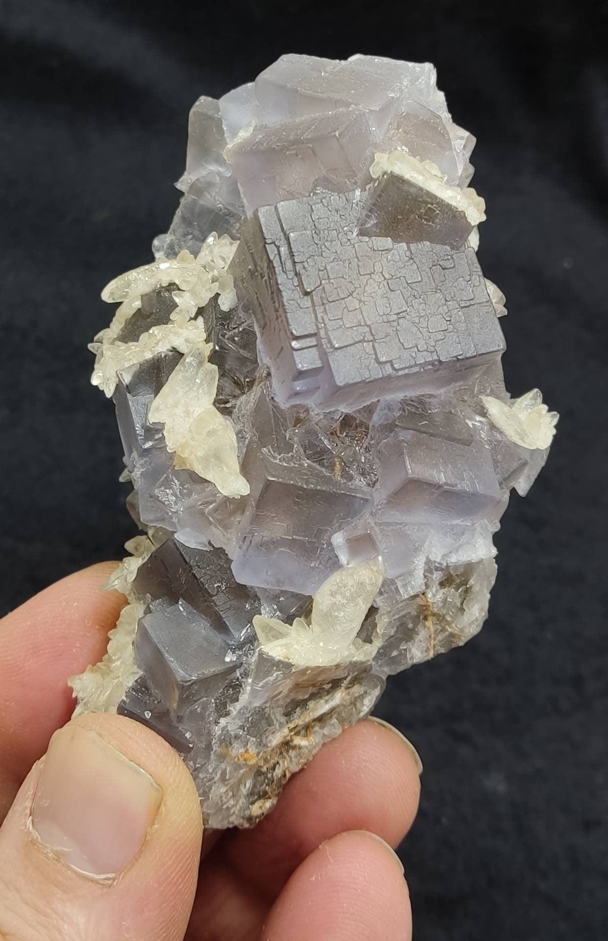 Single natural light purple Fluorite with Calcite on top 208 grams
