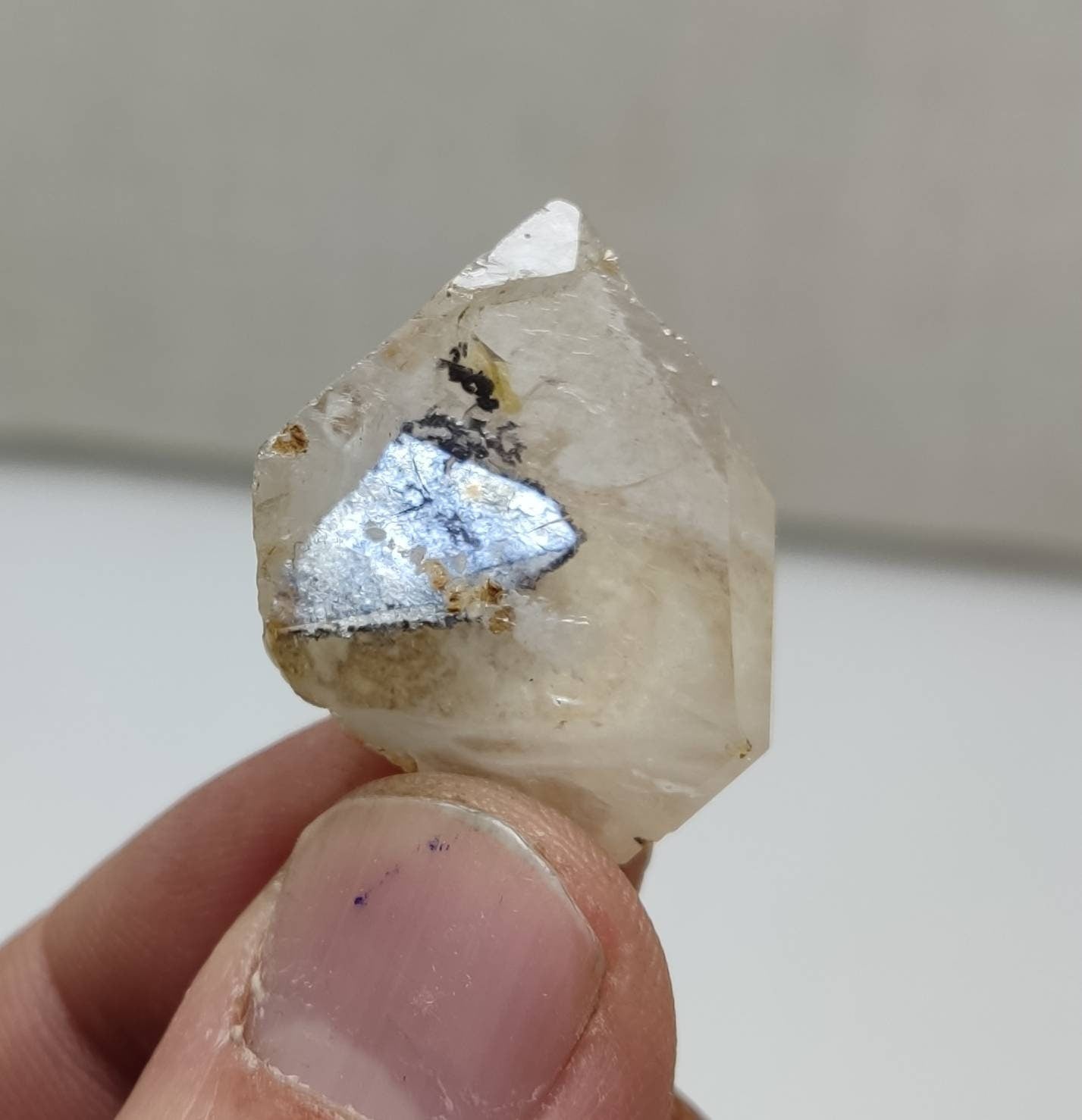 Quartz Crystal with hematite crystal inside 9 grams