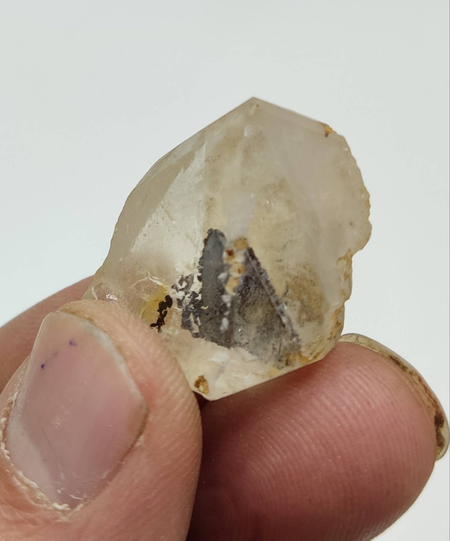 Quartz Crystal with hematite crystal inside 9 grams