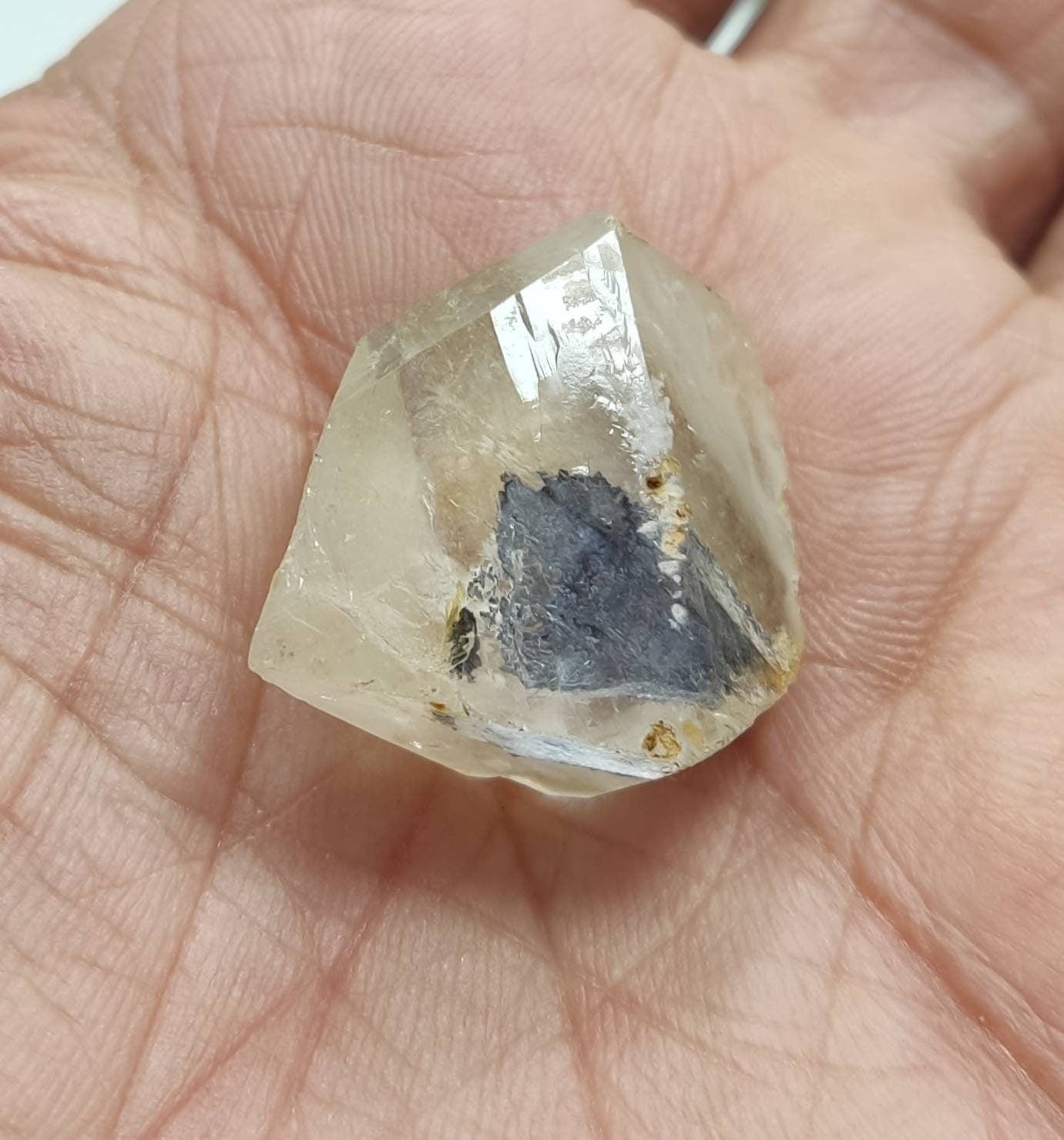 Quartz Crystal with hematite crystal inside 9 grams