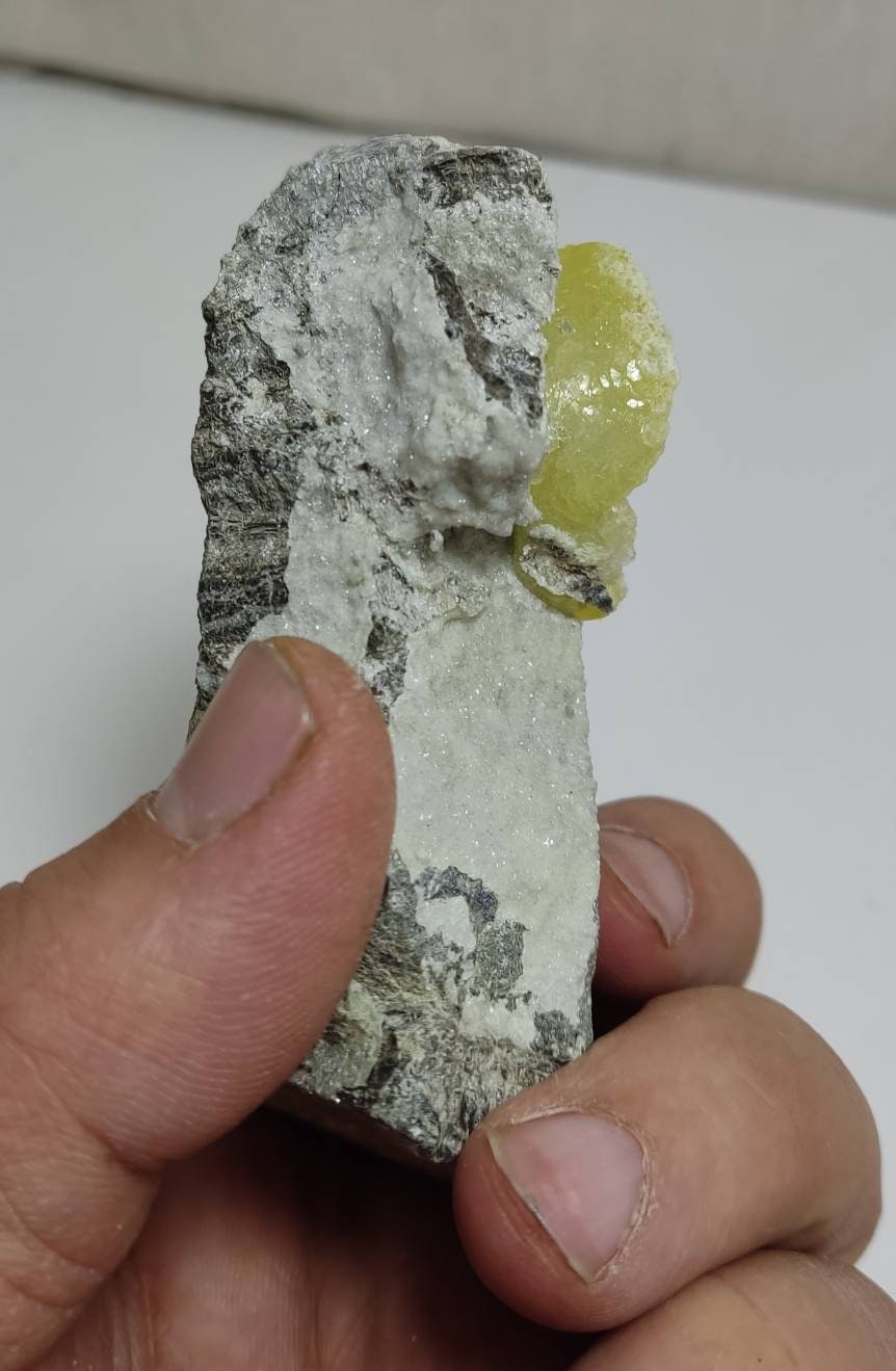 An amazing specimen of Natural yellow color Brucite on matrix 245 grams