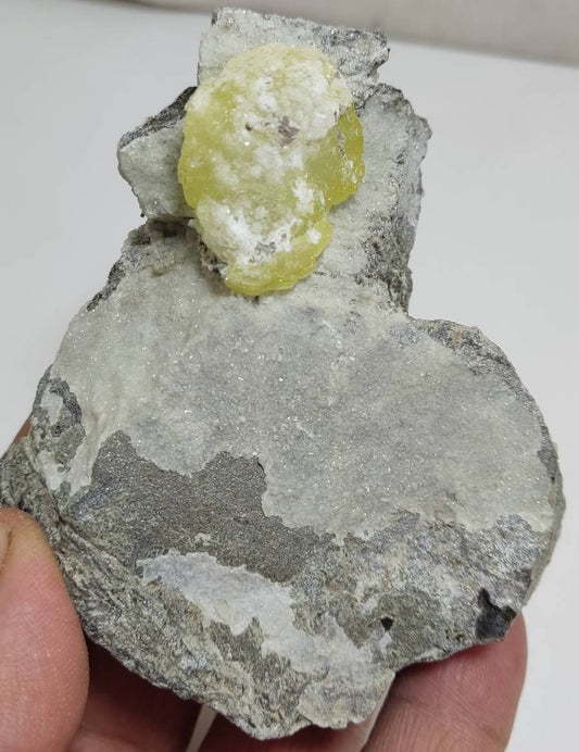 An amazing specimen of Natural yellow color Brucite on matrix 245 grams