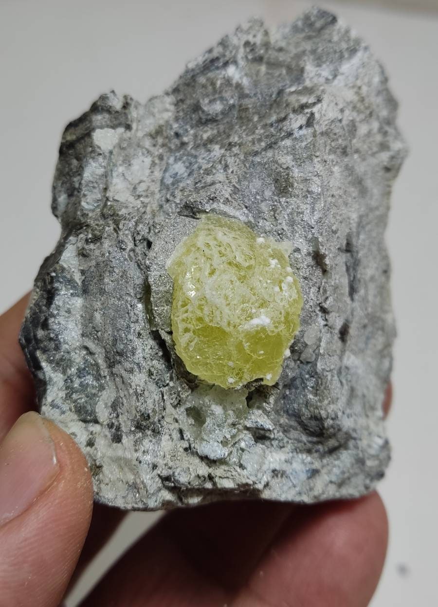 Natural yellow Brucite on matrix 194 grams