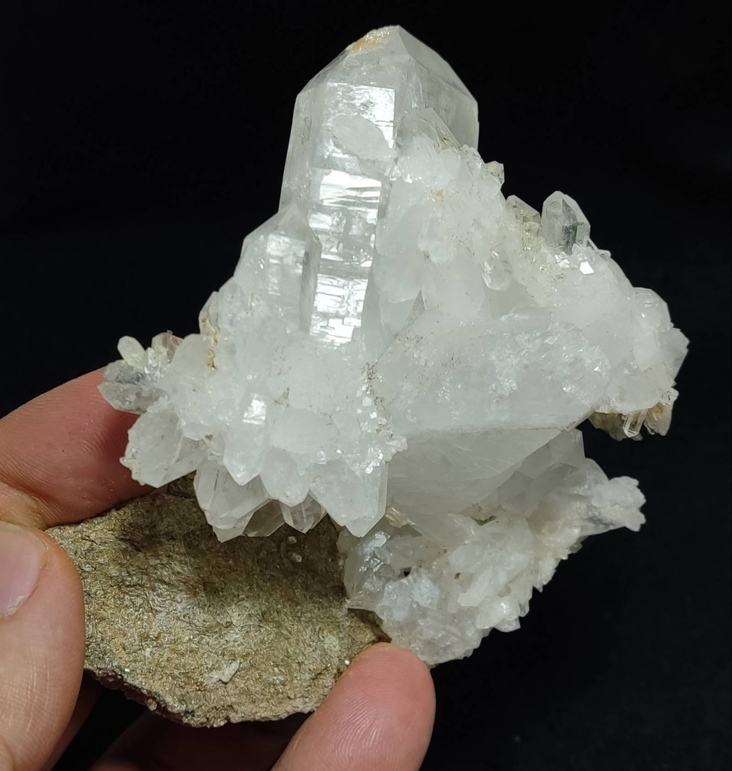 An amazing specimen of Terminated clear Quartz Crystals matrix 216 grams