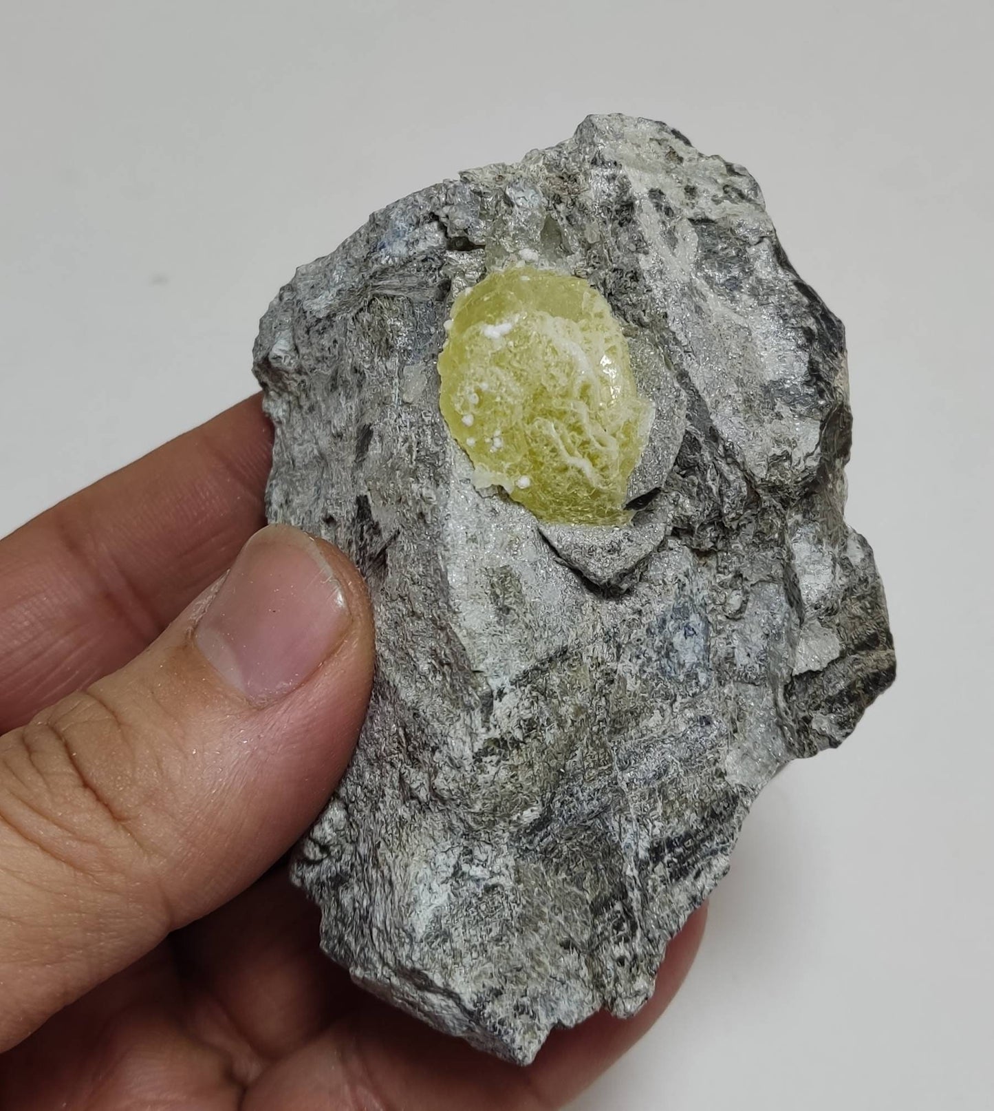 Natural yellow Brucite on matrix 194 grams