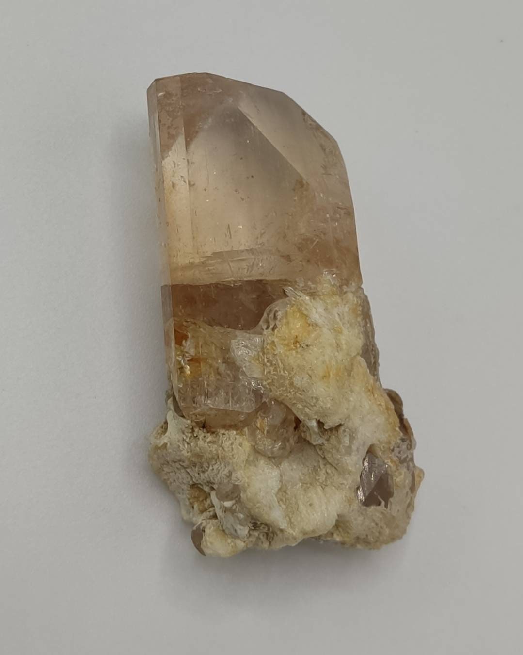 REPAIRED light peach color Topaz crystal 46 grams
