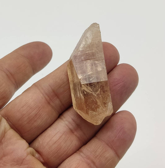 Single beautiful terminated gemmy peach color Topaz crystal 32 grams