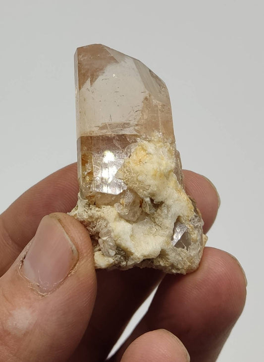 REPAIRED light peach color Topaz crystal 46 grams