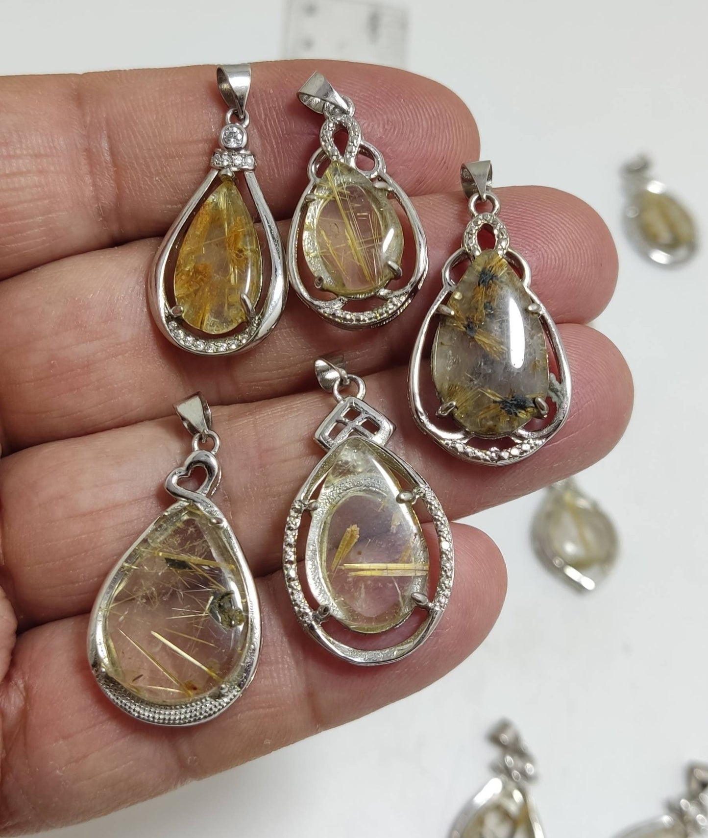 Rutilated polished quartz silver lockets 16 pieces