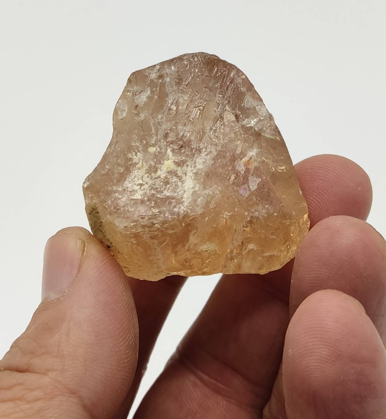 Single beautiful terminated gemmy peach color Topaz crystal 65 grams