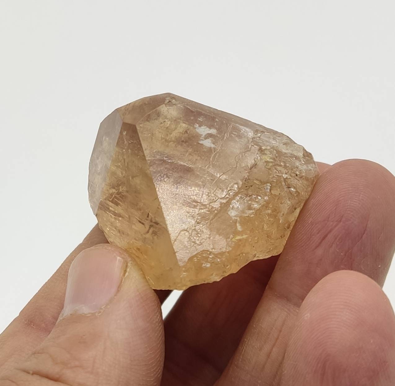 Single beautiful terminated gemmy peach color Topaz crystal 65 grams