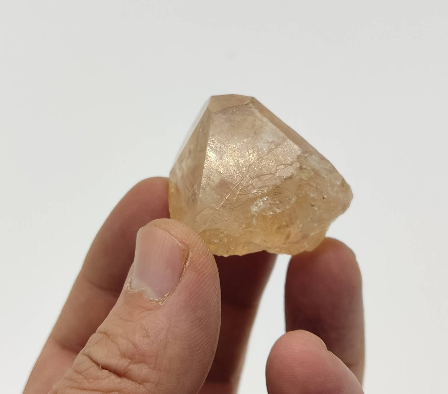 Single beautiful terminated gemmy peach color Topaz crystal 65 grams