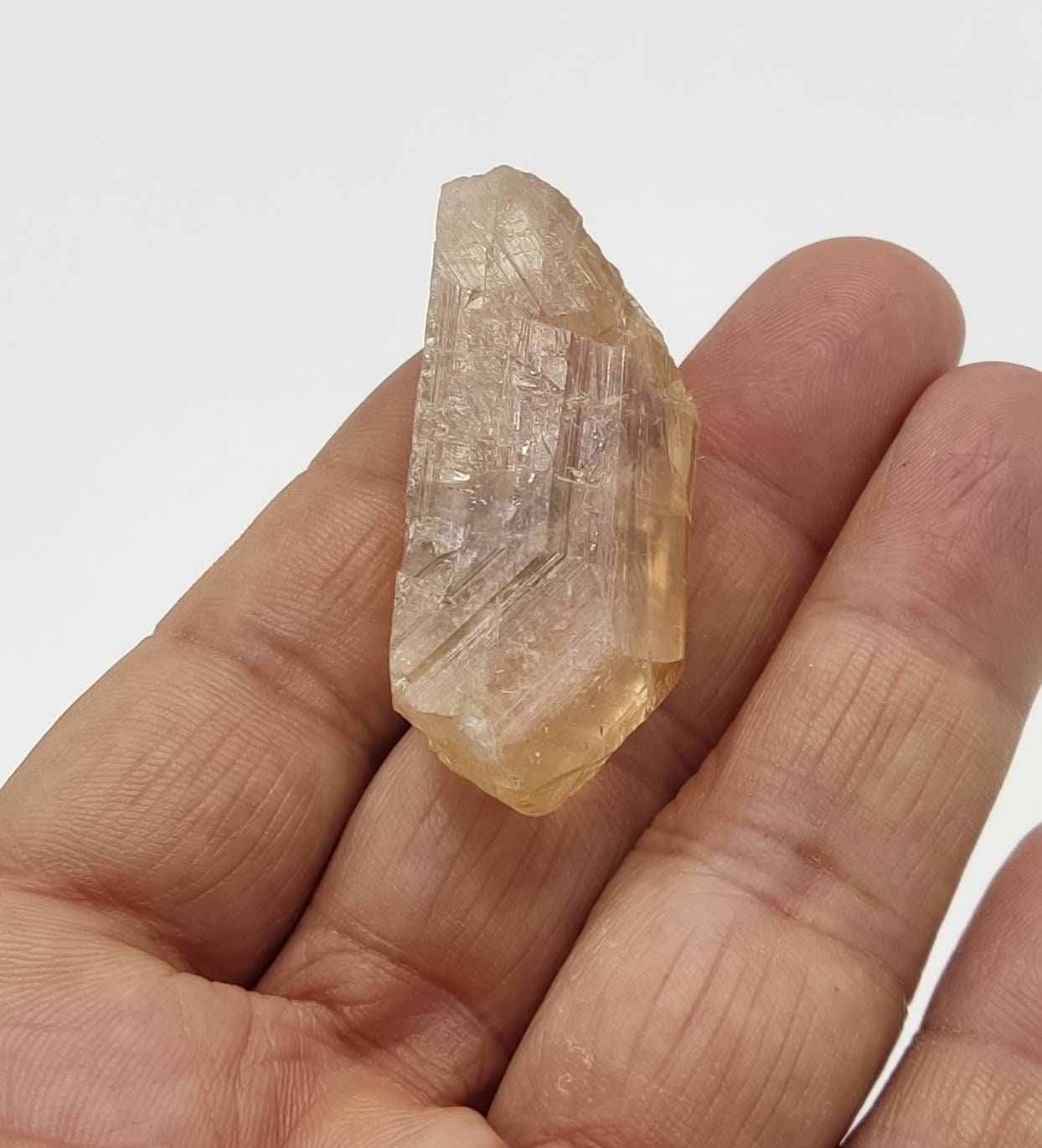 Single beautiful terminated gemmy peach color Topaz crystal 32 grams