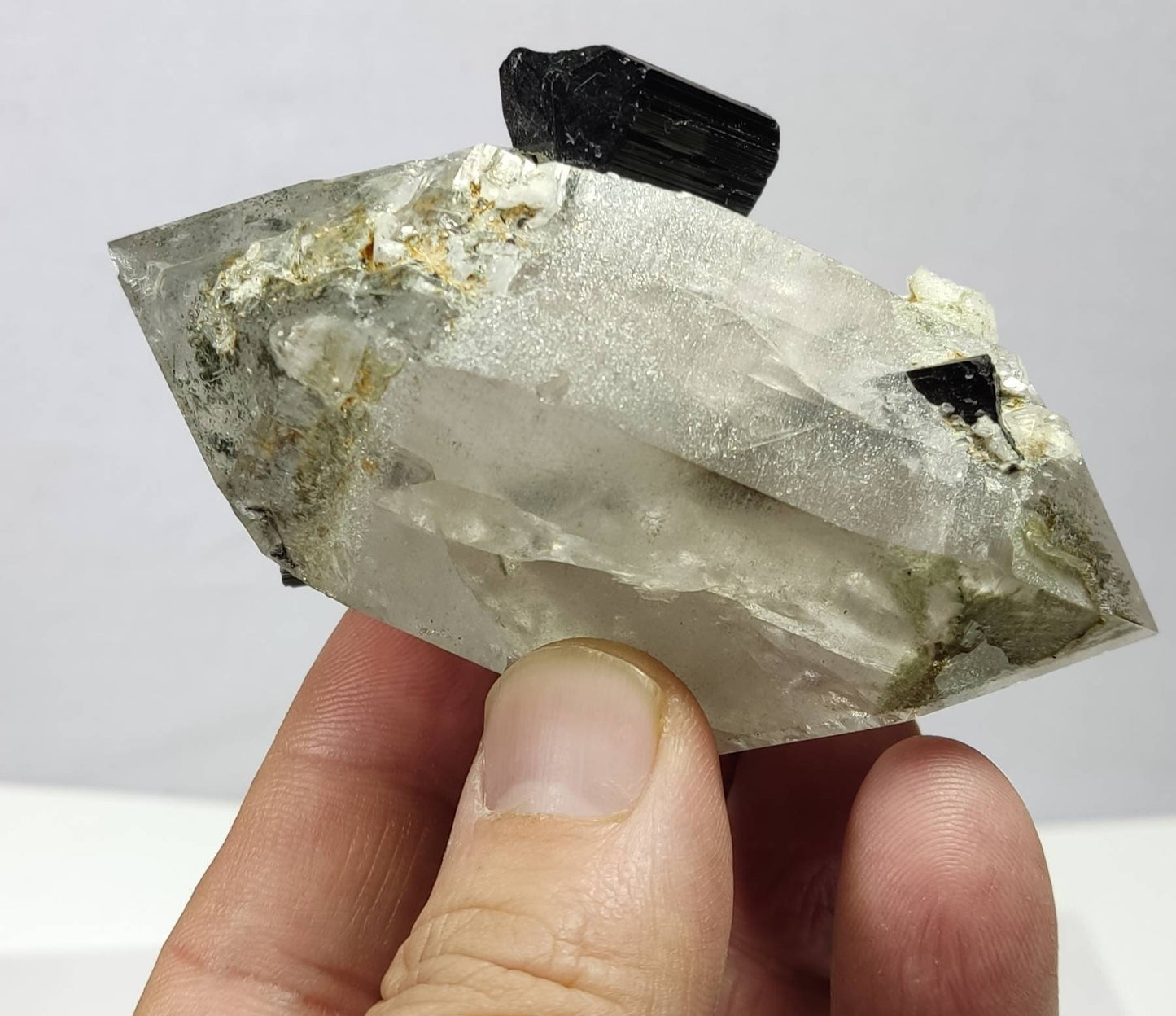 Double terminated quartz crystal with Tourmaline crystal  187 grams