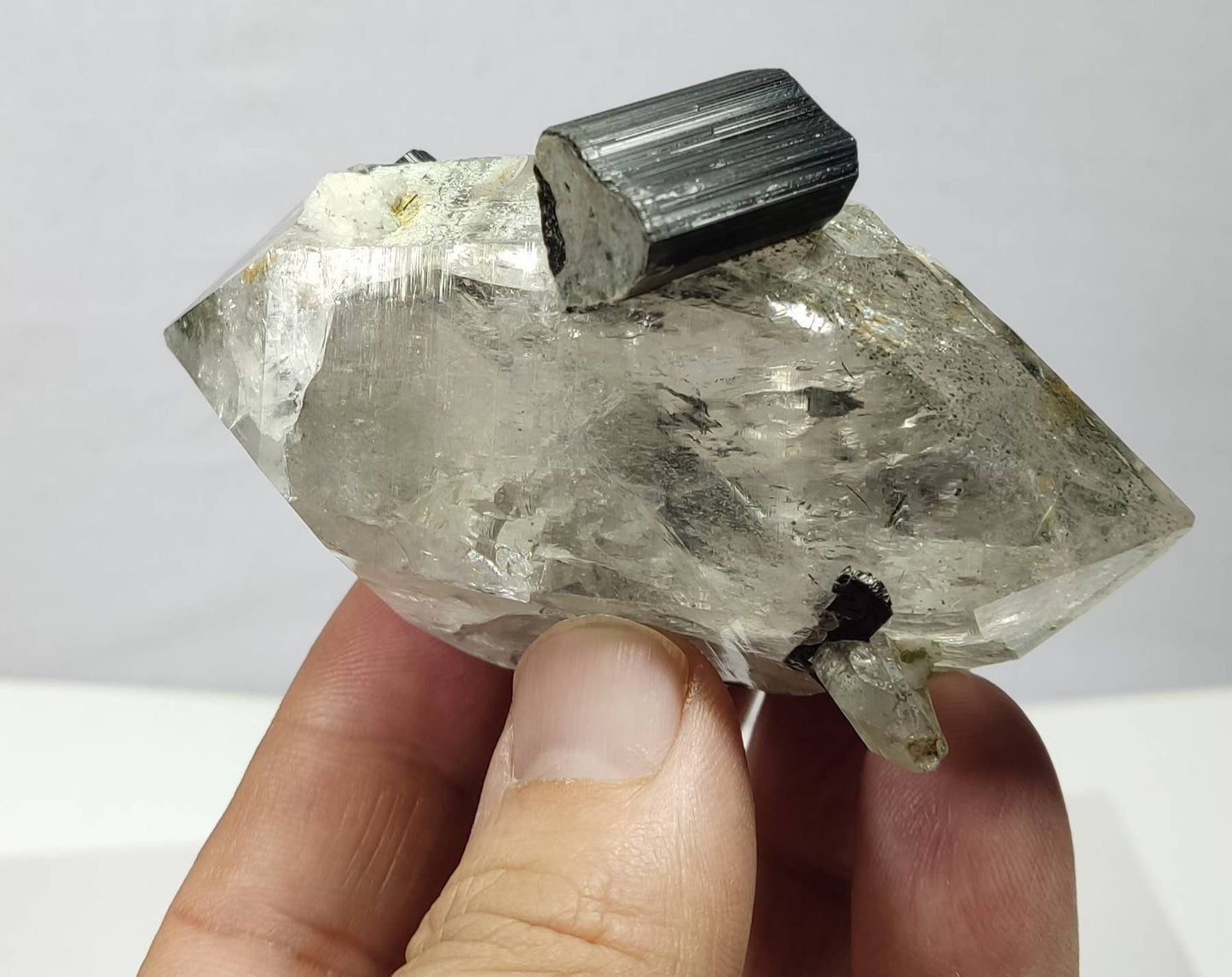 Double terminated quartz crystal with Tourmaline crystal  187 grams