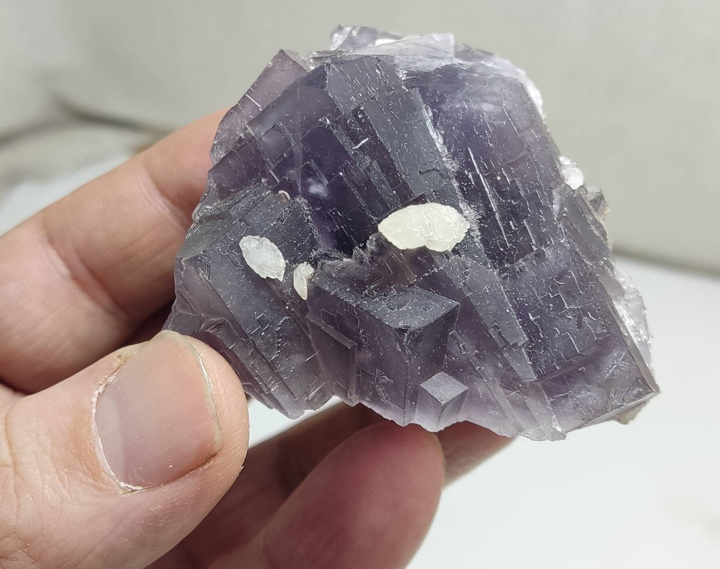 An amazing Single beautiful specimen of grey/purple fluorite with calcite crystals 150 grams