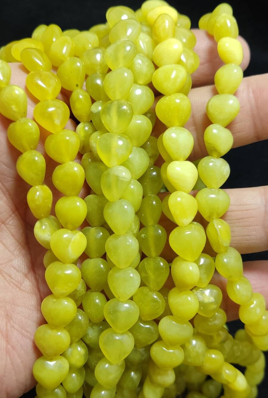 Single High Quality Serpentine drilled beads strand 13-15 inch