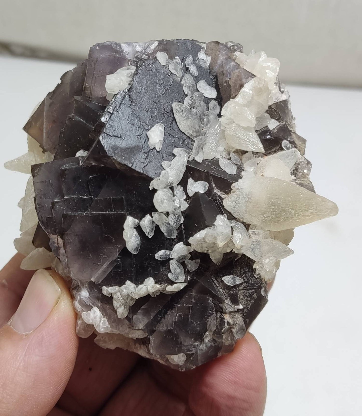 An amazing Single beautiful specimen of grey fluorite with calcite crystals 364 grams