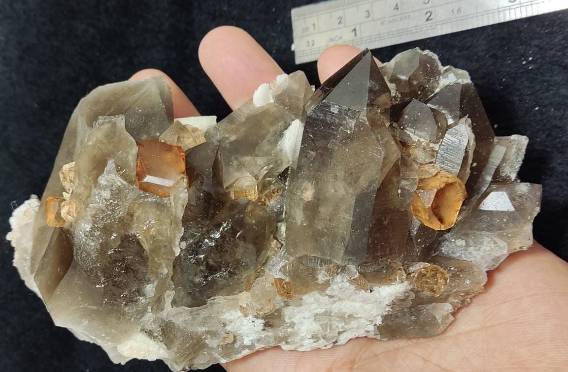 An amazing Specimen of terminated peach color Topaz crystals with quartz on matrix 557 grams