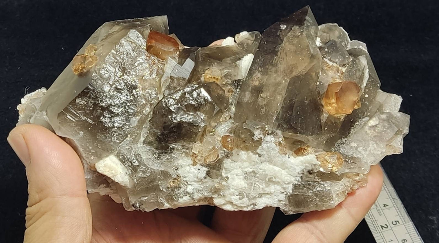 An amazing Specimen of terminated peach color Topaz crystals with quartz on matrix 557 grams