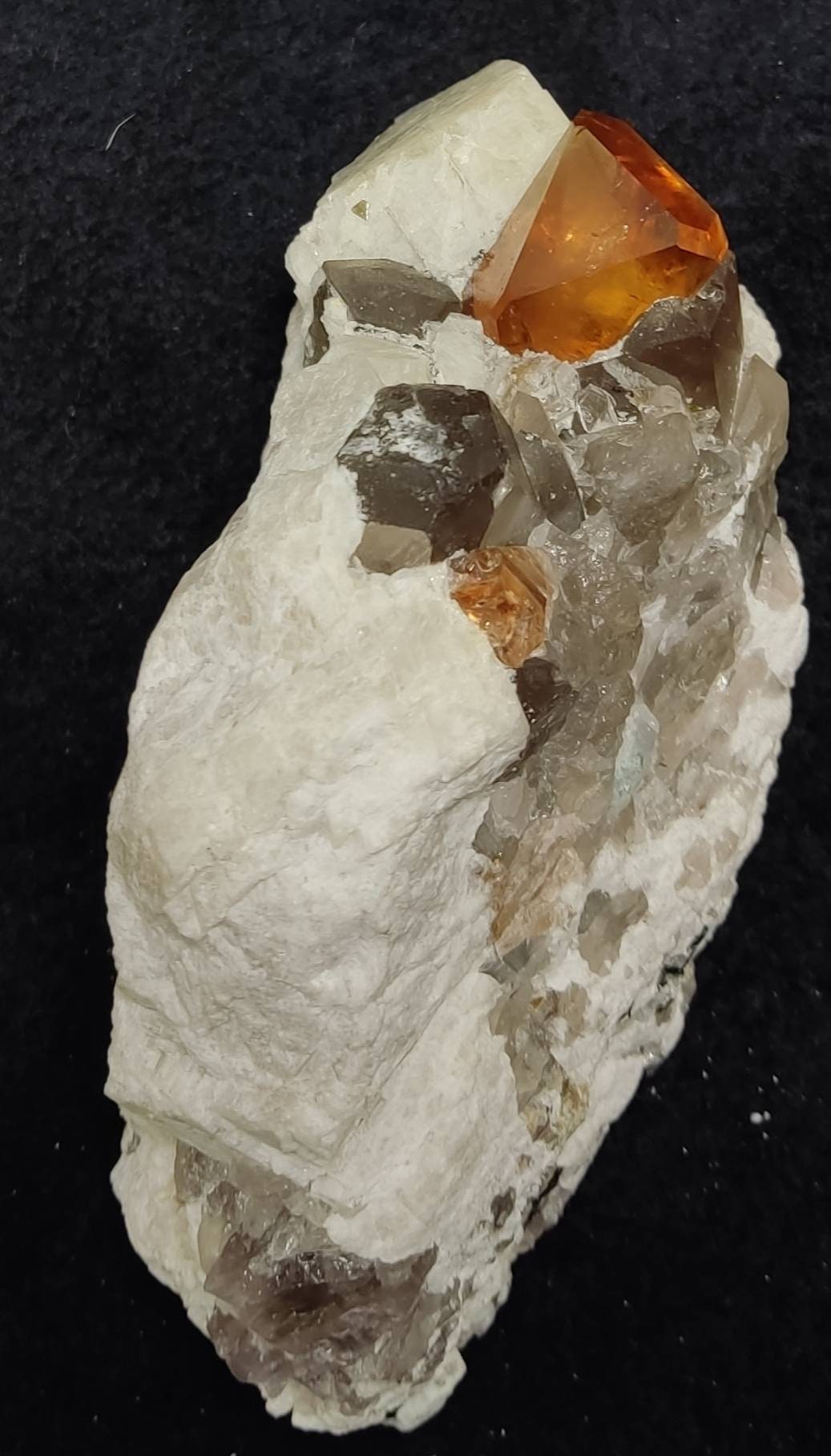 Terminated peach color Topaz crystal on matrix 576 grams