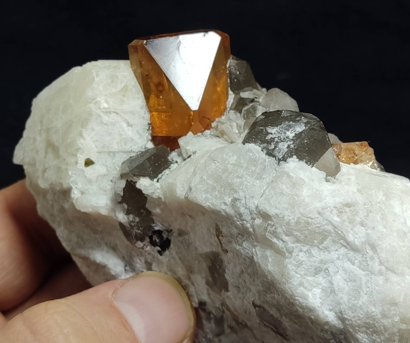 Terminated peach color Topaz crystal on matrix 576 grams