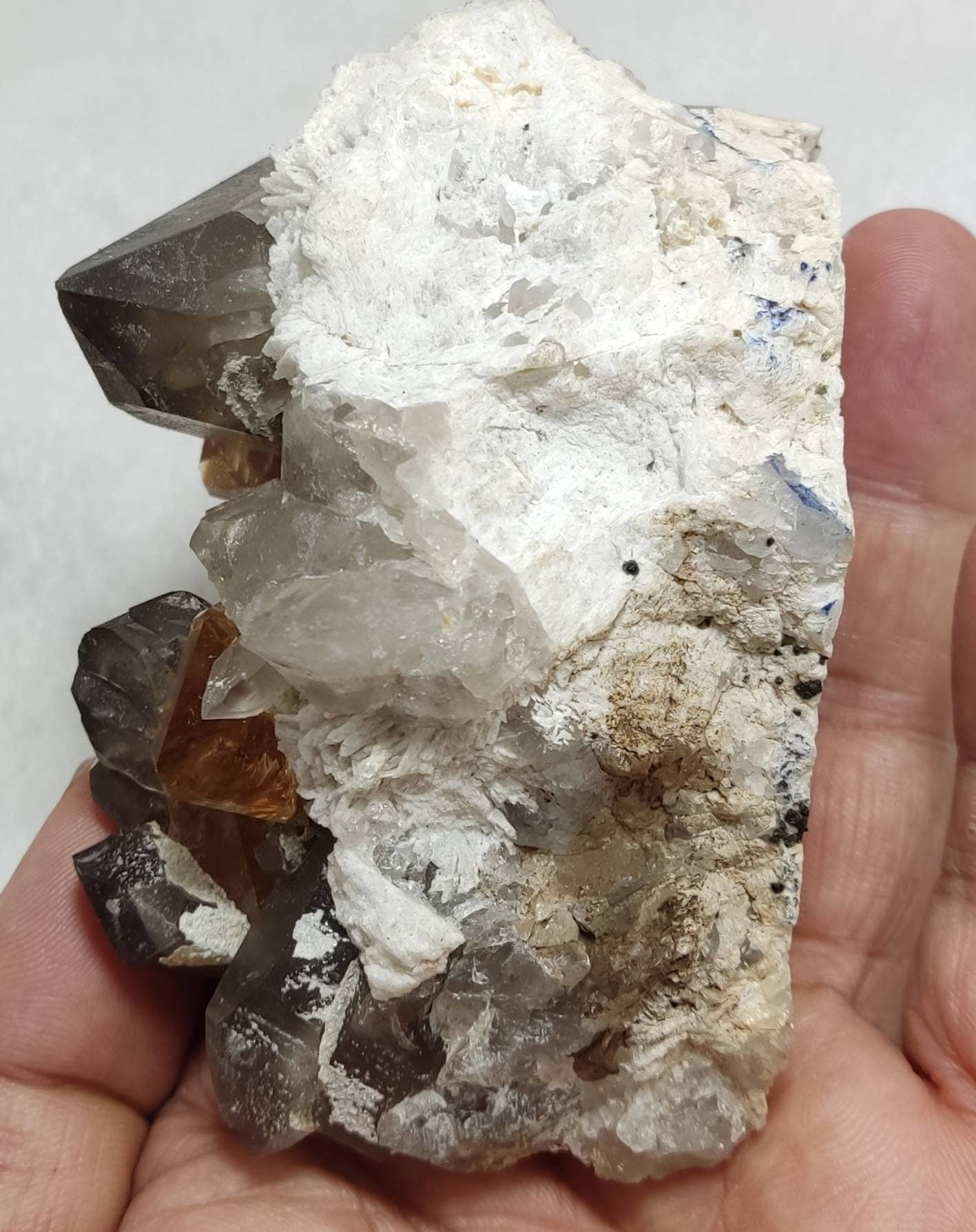 An amazing Specimen of terminated peach color Topaz crystals on matrix 455 grams