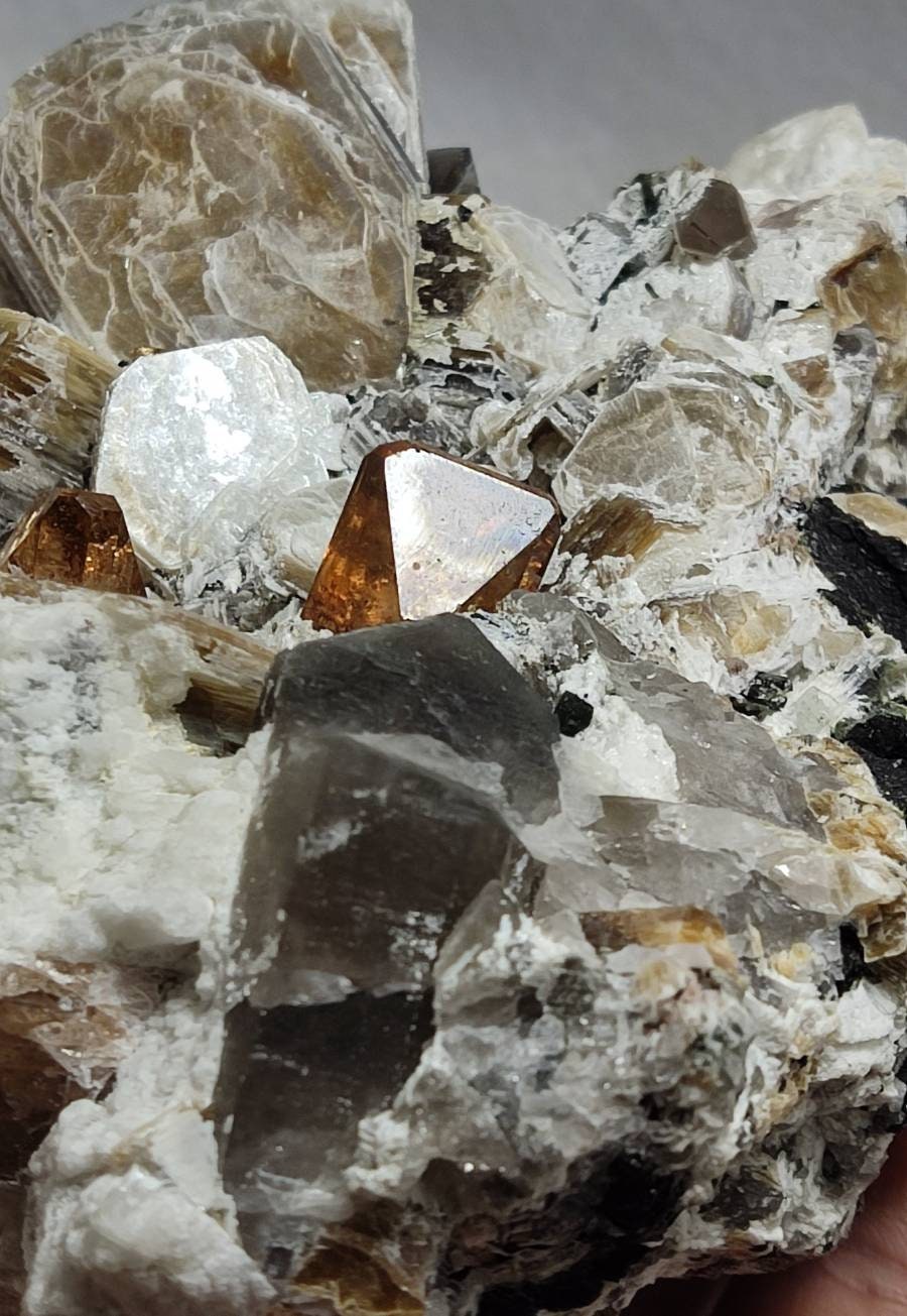 peach color Topaz crystals on matrix 686 grams