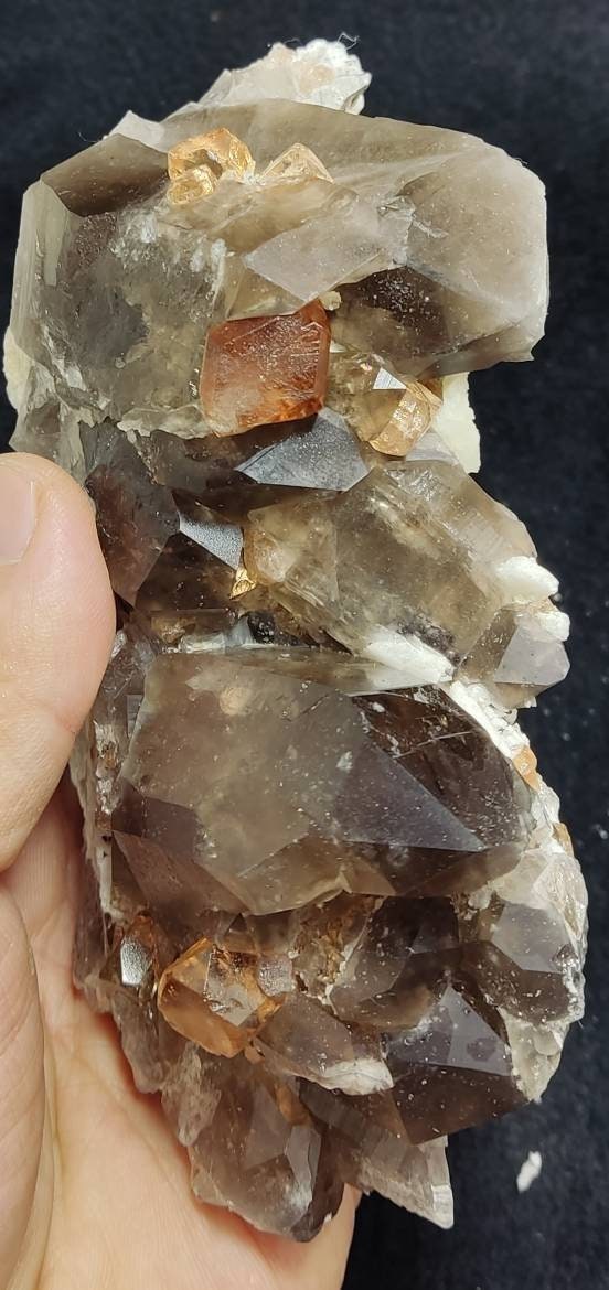 An amazing Specimen of terminated peach color Topaz crystals with quartz on matrix 557 grams