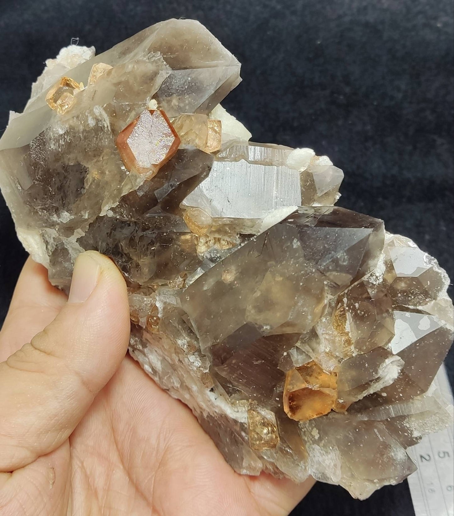 An amazing Specimen of terminated peach color Topaz crystals with quartz on matrix 557 grams