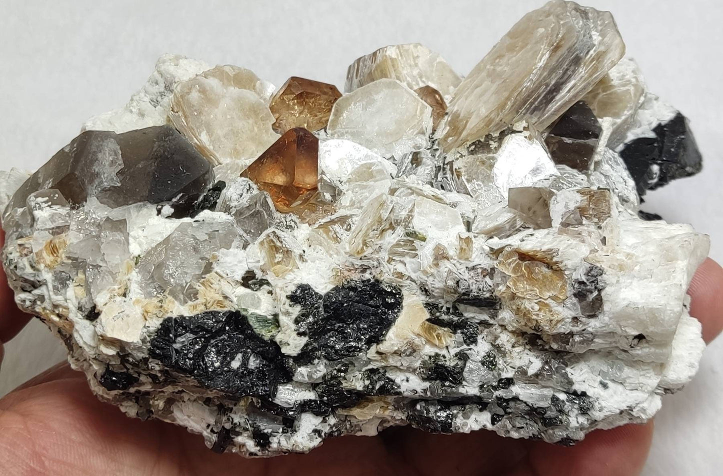 peach color Topaz crystals on matrix 686 grams