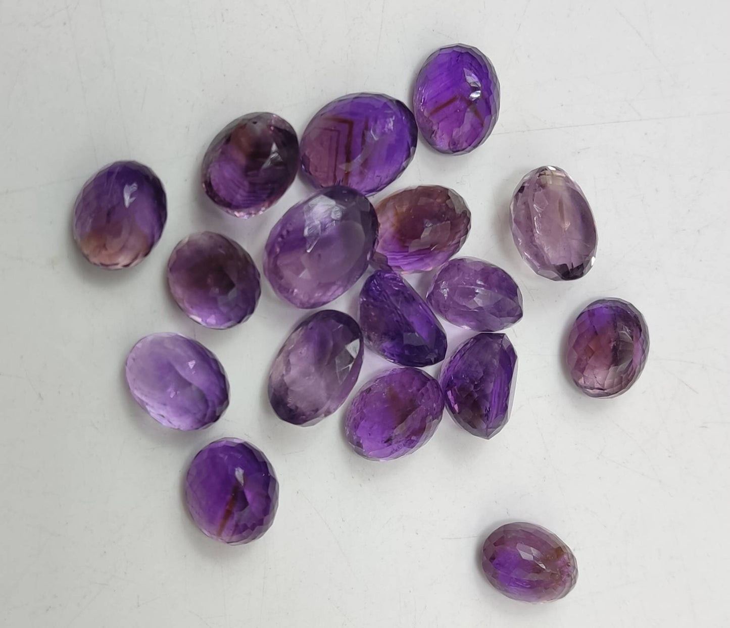 An amazing lot of faceted Amethyst gemstones 17 pieces 186 carats weight