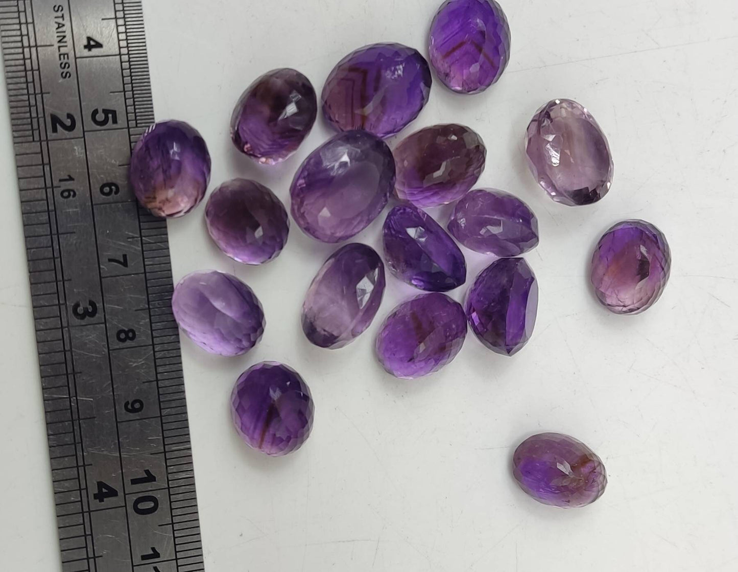 An amazing lot of faceted Amethyst gemstones 17 pieces 186 carats weight