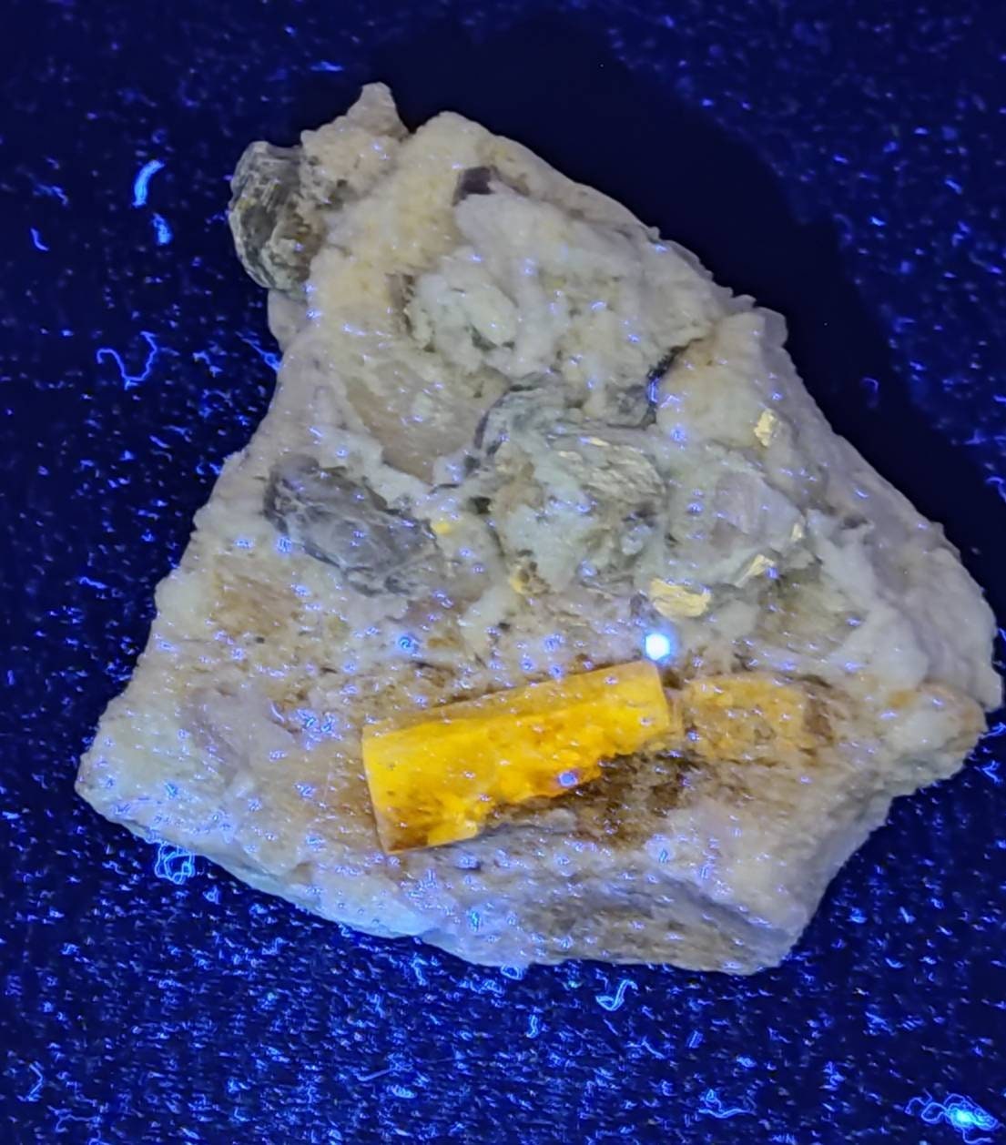 Feldspar muscovite, and apatite 319 grams