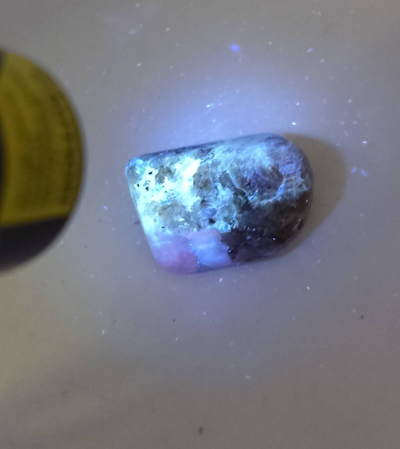 Fluorescent Hackmanite polished tumble 25 grams