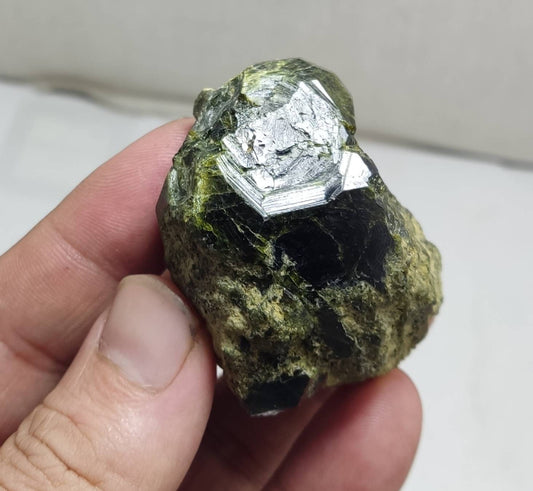 Garnet variety demantoid crystal 135 grams