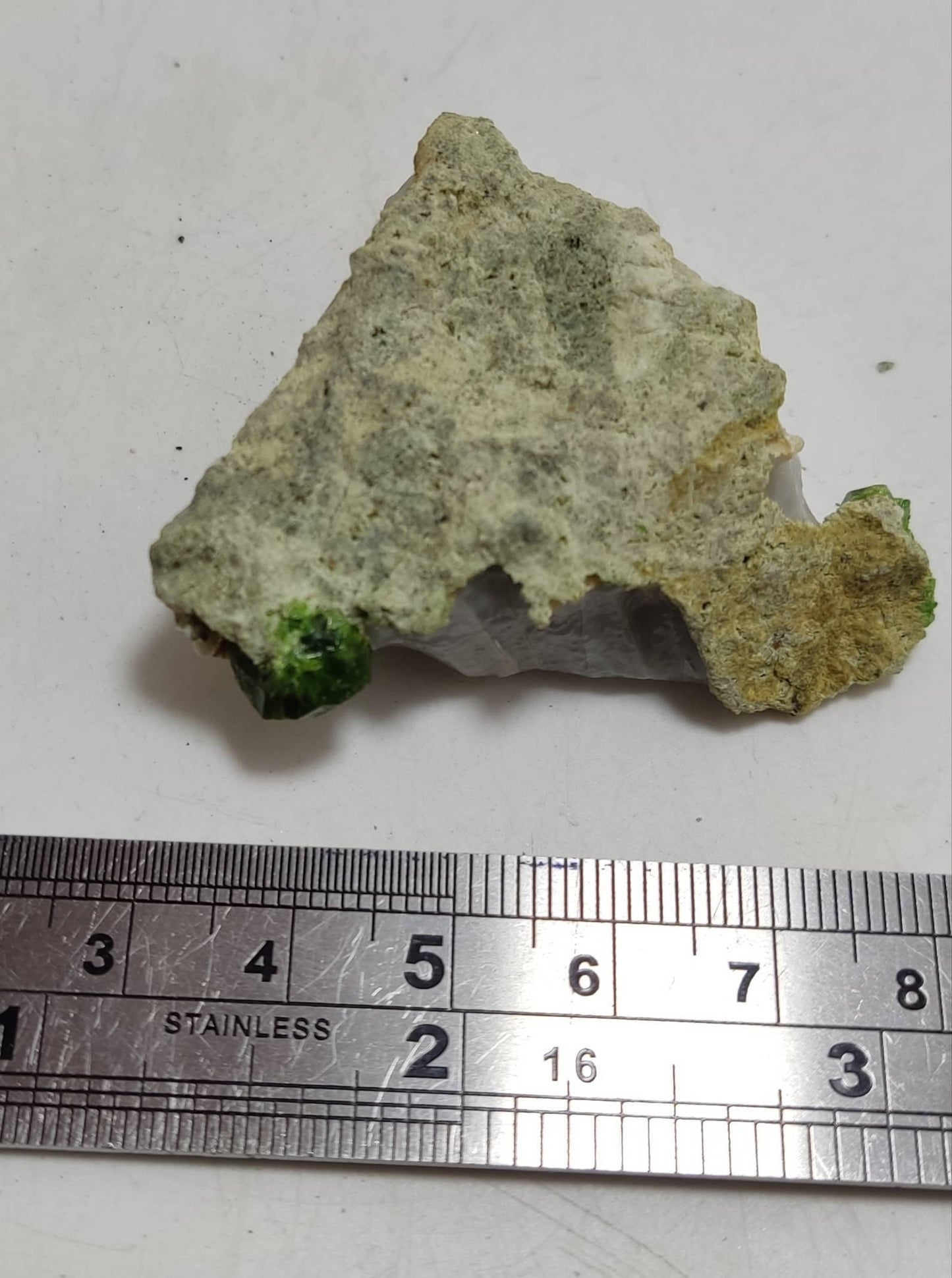 An amazing specimen of garnet variety demantoid crystal on matrix 38 grams