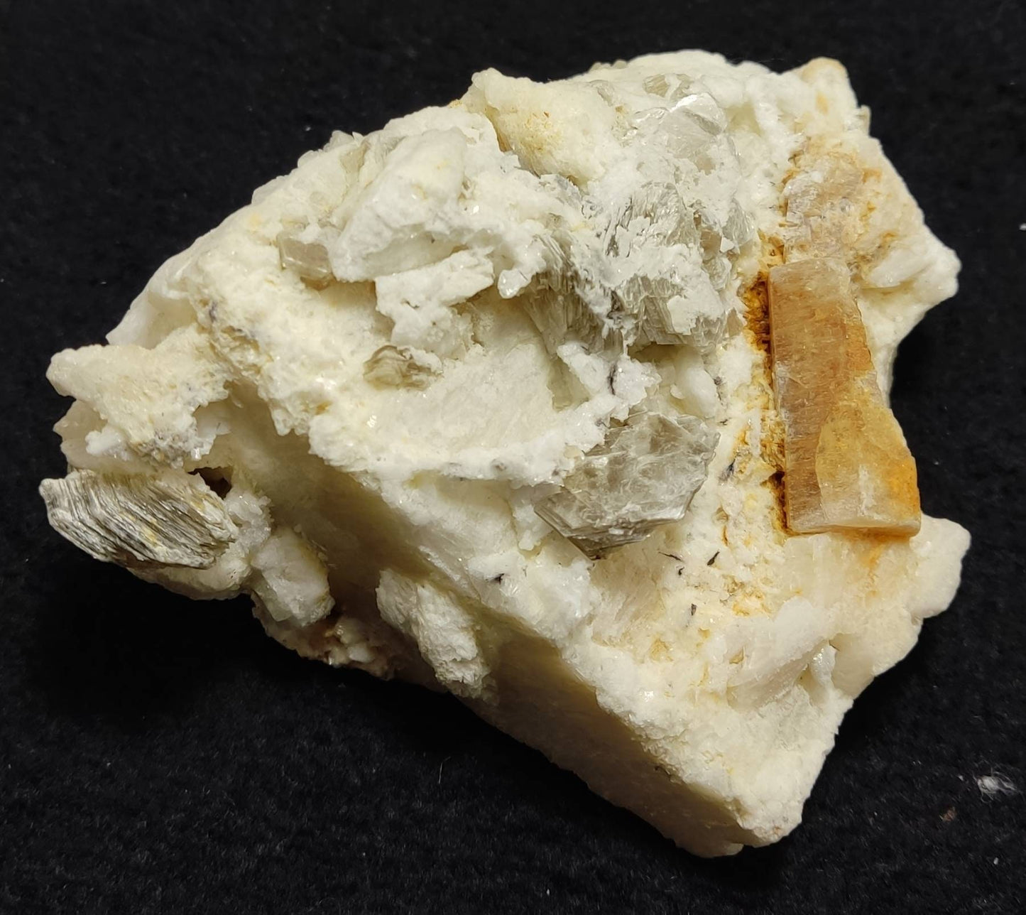 Feldspar muscovite, and apatite 319 grams