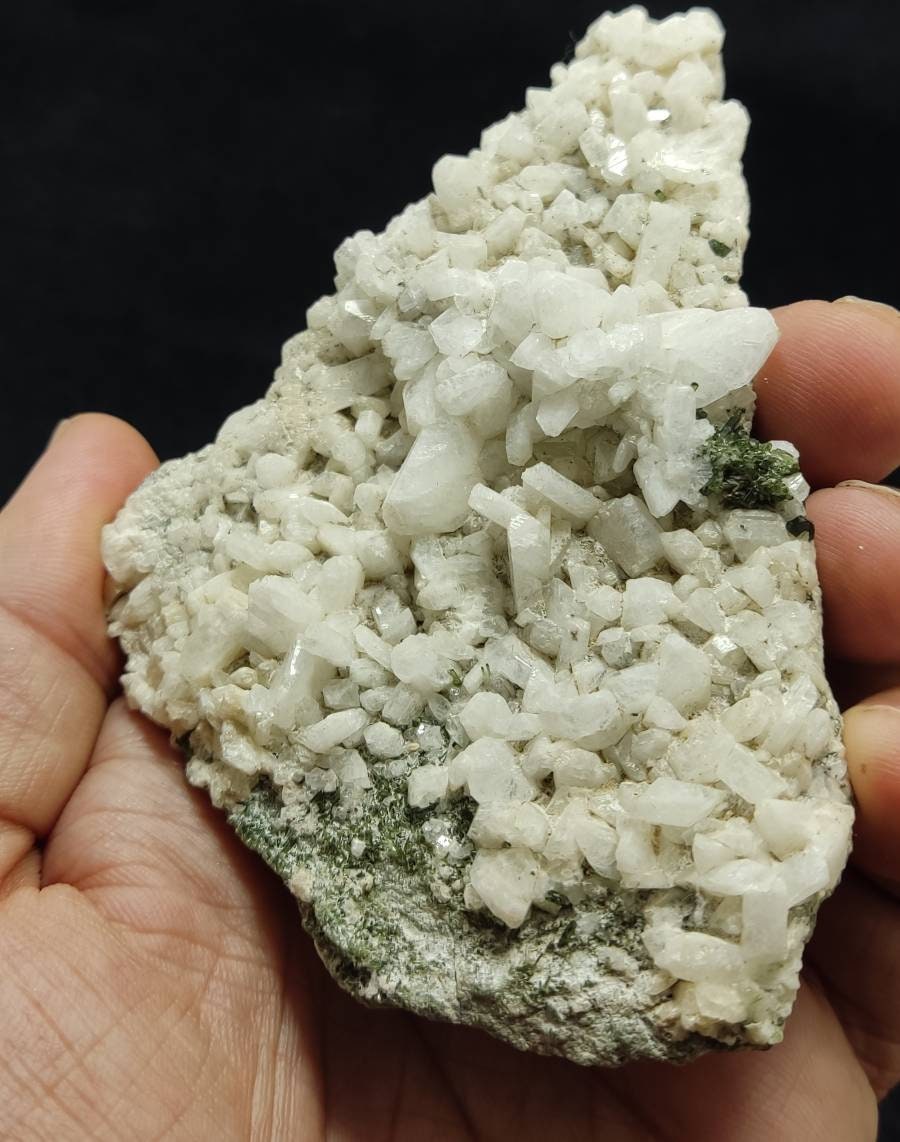An aesthetic specimen of feldspar Adularia cluster with epidote inclusions 136 grams
