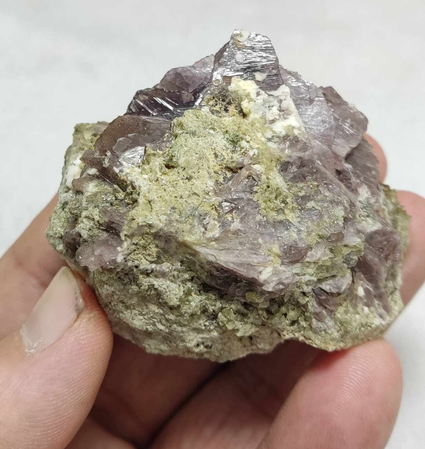 Axinite crystals on matrix with the epidote 139 grams