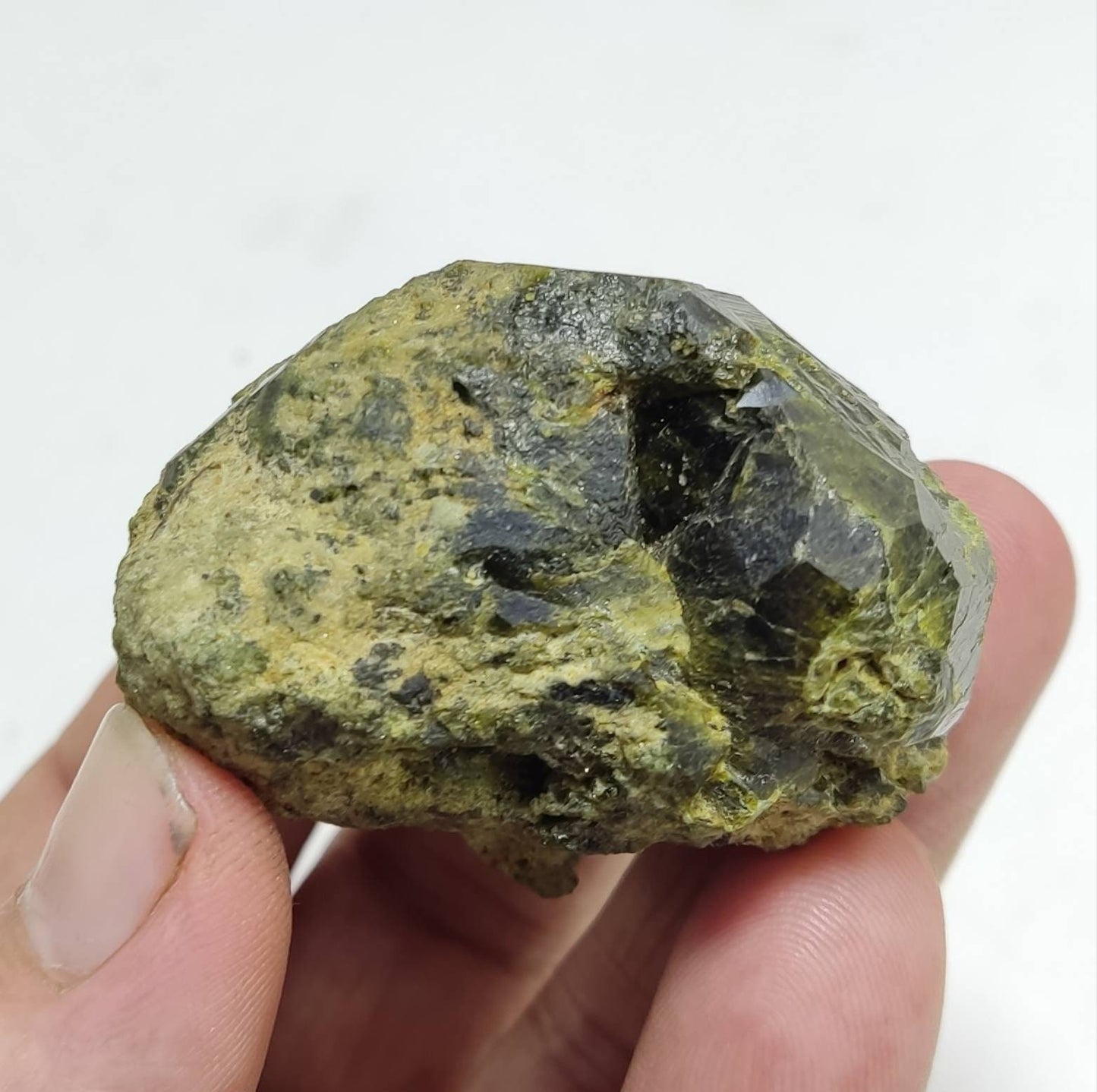 Garnet variety demantoid crystal 135 grams